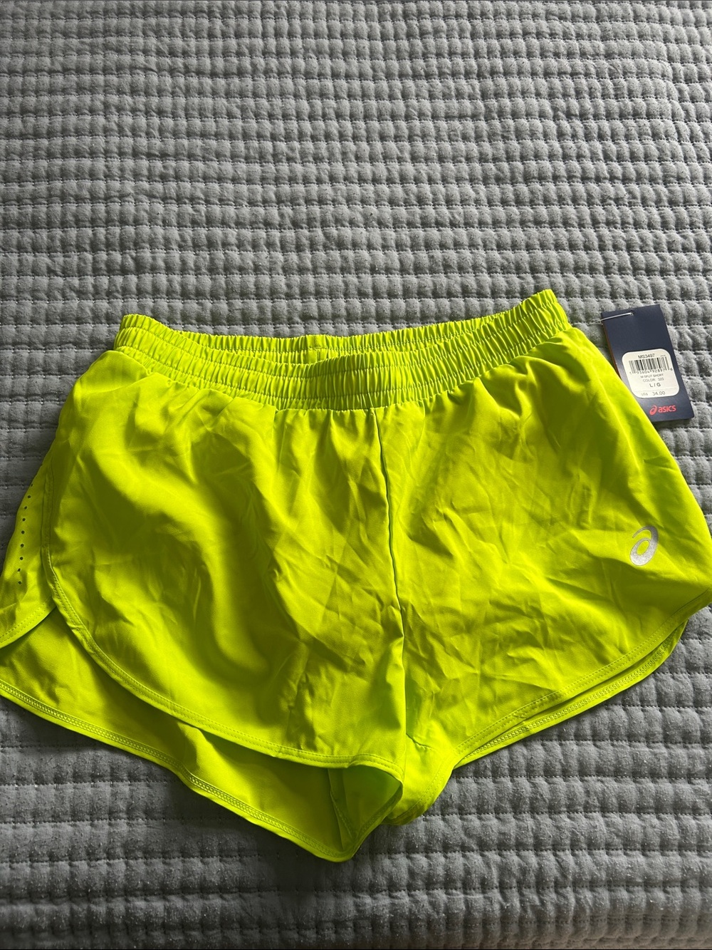Asics Women’s Neon Yellow High-Visibility Athletic Shorts